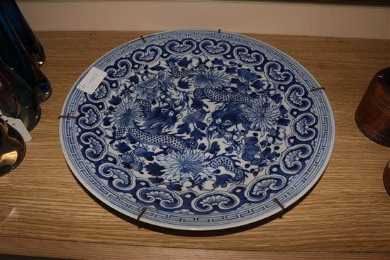 A Chinese blue and white dragon dish and a blue and white crackle glaze bowl, 19th century 37 & 26cm.